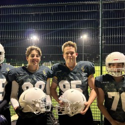 Members of our American Football Team with their new helmets