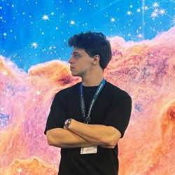 Image of David, a Astronautics and Space Engineering MSc student, in front of a colourful cosmic background.