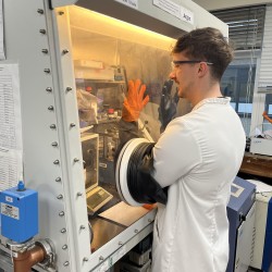 Eden Marks working in glove box
