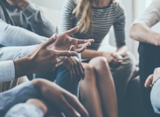 A group of people discussing