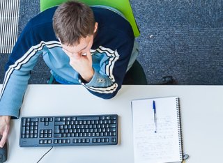 Male students at computer