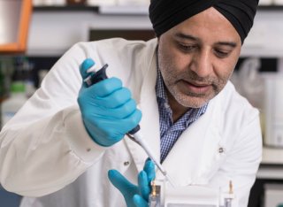 A male academic in a laboratory