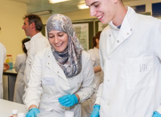 Two prospective biosciences students in the laboratory on open day