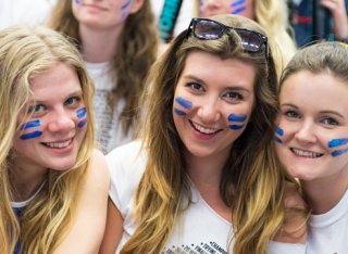 Three female students smiling
