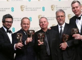 Chris Benstead and colleagues with their BAFTA awards