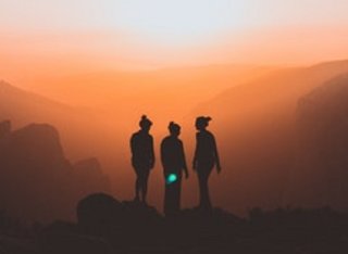 Silhouettes of three women