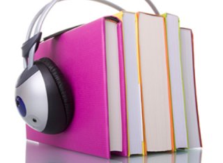 Books with headphones on top of them