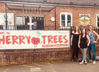 University of Surrey staff stood outside Cherry Trees after volunteering in Guildford