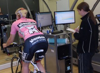 A female cyclist being tested in the Surrey Human Performance Institute