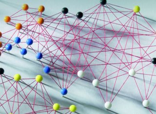 Map with pins connected by string