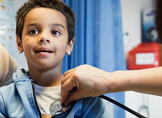 A child being treated by a nurse