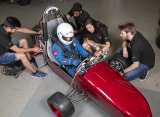Students building a racing car