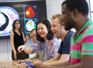 Students talking in a classroom