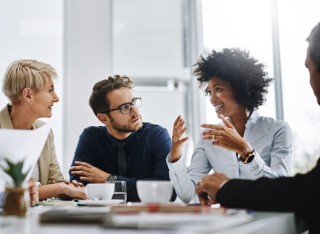 People talking at a table