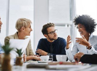 People talking at a table