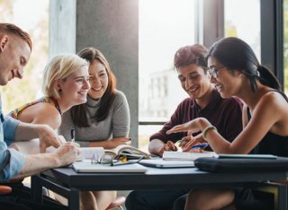 People talking at a table