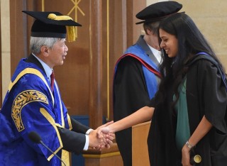 Student in graduation ceremony