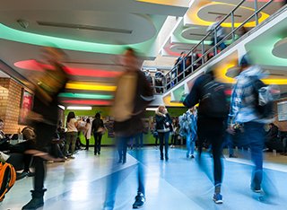 Students moving through the lecture theatre block