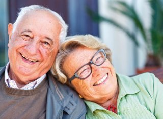 Older couple smiling together