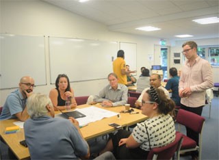 iSCAPE team talking together