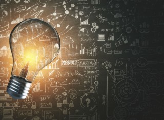 A brightly lit light bulb depicts a range of innovative ideas