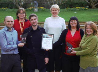 The University of Surrey Placement Team pose with their 2019 and 2020 awards