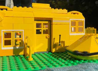 A yellow LEGO house 
