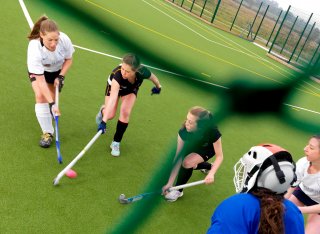 Students playing hockey