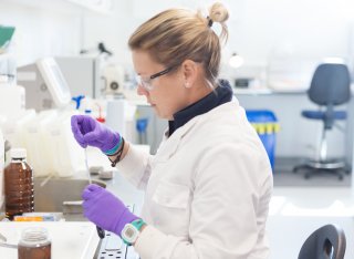 Person using a pipette