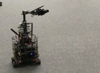 Robot being demonstrated on the platform