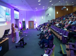 Joanna Yarrow speaking at Roland Clift lecture with audience