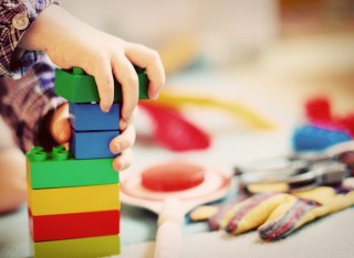 A child playing with building blocks