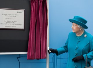 Her Majesty The Queen unveiling a plaque