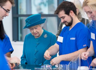 Her Majesty The Queen watching student practise clinical skills