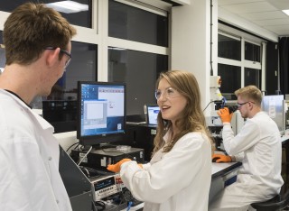 Physics students in lab