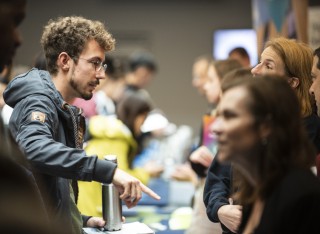 Student talks to a team member at International Orientation Day 2019