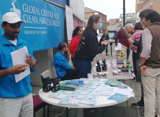 GCARE team talking to the community at Car Free Day