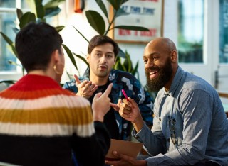 A group of people work together 