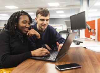 Students working in the library 