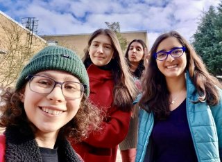 Luana with friends on campus