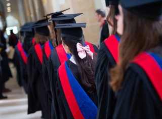 Graduands walking towards the stage in the Cathedral