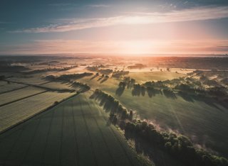 sun shining over landscape - getty image