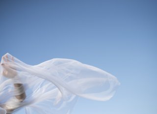 clothing blowing in the wind with blue sky background