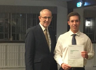 Tyler Dansie-Smith with certificate