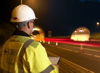 Surrey civil engineering student looking at entrance to Hindhead Tunnel