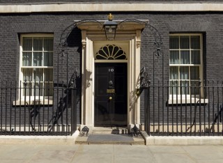 A picture of the front door of 10 Downing Street