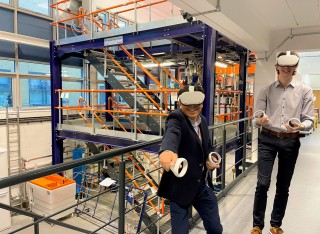 Esat Alpay using VR headset in the pilot plant
