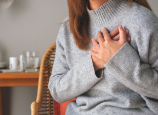 Woman having heart issues credit to Getty