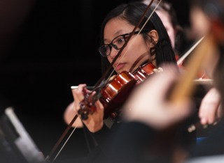 Music student playing violin