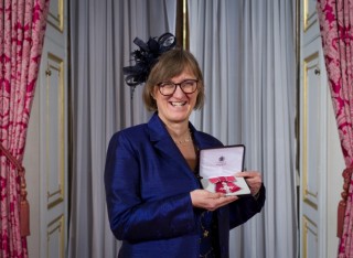 Susannah Schofield, receives her MBE for services to journalism and to diversity in the broadcasting industry